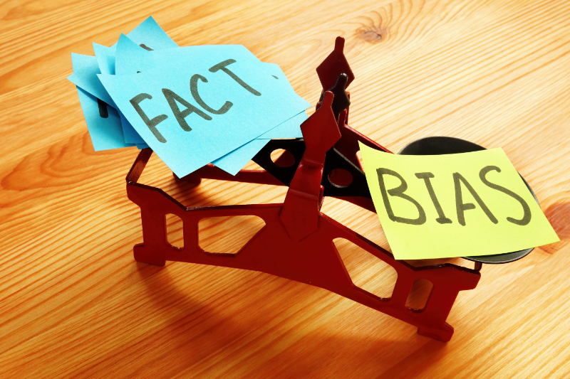 photo of scale showing either fact or bias