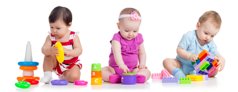 photo of three infants playing with toys